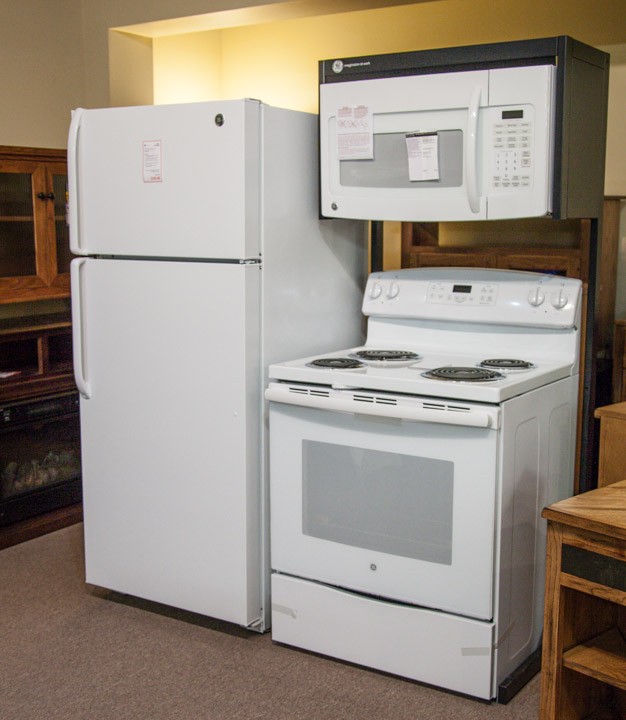 White refrigerator, microwave and oven