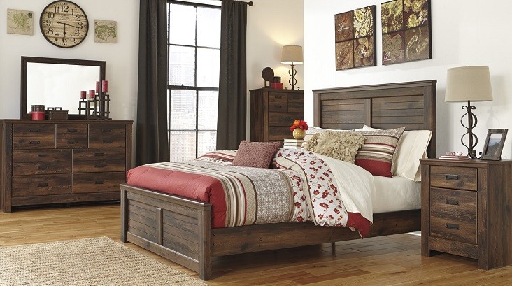 Bed with panel headboard and matching furniture